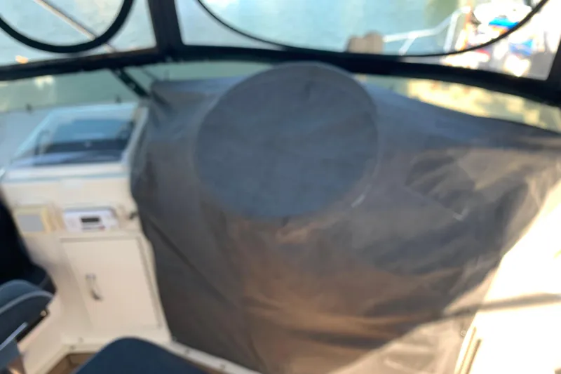 Sea Trial Yacht Photos Pics 1991 Hatteras 40 Motor Yacht cockpit with covered controls and seating area.