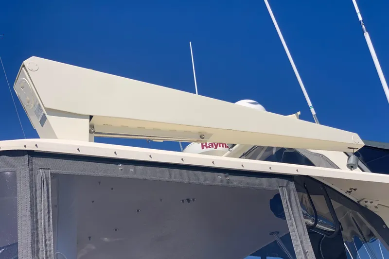 Sea Trial Yacht Photos Pics 1991 Hatteras 40 Motor Yacht radar system against clear blue sky.
