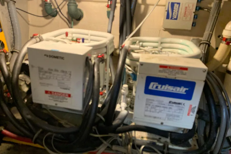 Sea Trial Yacht Photos Pics Engine room of 1991 Hatteras 40 Motor Yacht with Dometic and Cruisair units.