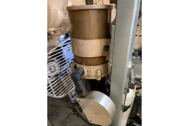 Sea Trial Yacht Photos Pics Engine component of a 1991 Hatteras 40 Motor Yacht, featuring a cylindrical filter.