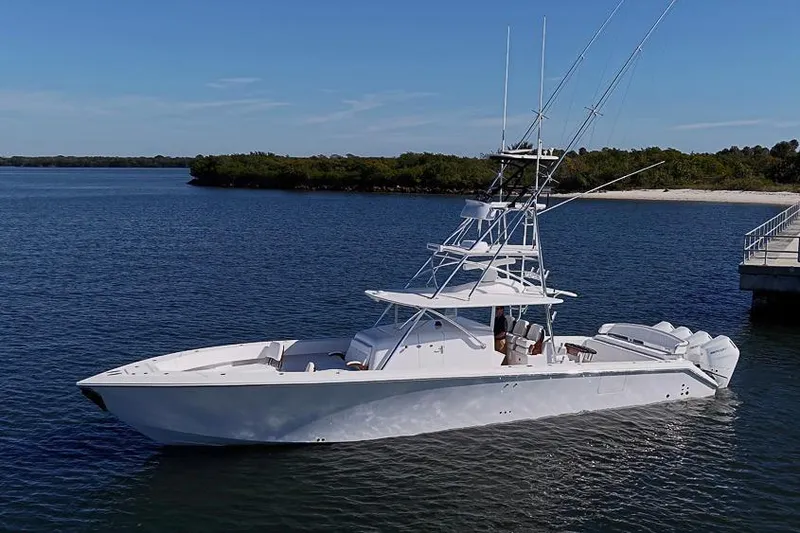  Yacht Photos Pics Sparks 46 yacht, 2025 model, cruising on a serene lake with clear blue skies.