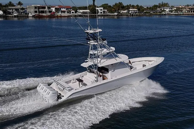  Yacht Photos Pics A sleek 2025 Sparks 46 yacht cruising on a calm waterway.