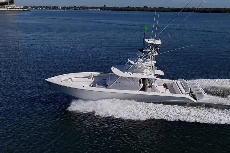  Yacht Photos Pics A 2025 Sparks 46 boat cruising on calm blue waters.