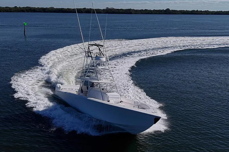  Yacht Photos Pics A 2025 Sparks 46 boat making a sharp turn on open water.