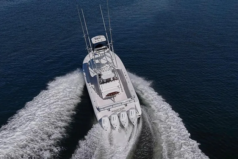  Yacht Photos Pics Aerial view of 2025 Sparks 46 boat cruising on open water.