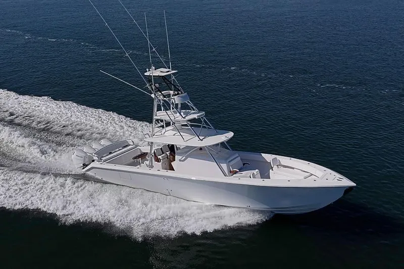  Yacht Photos Pics A sleek 2025 Sparks 46 yacht cruising swiftly on open water.