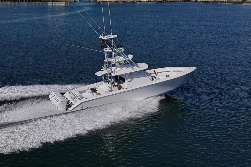  Yacht Photos Pics A 2025 Sparks 46 boat cruising on open water, showcasing sleek design and powerful performance.