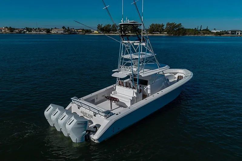  Yacht Photos Pics Modern Sparks 46 boat, 2025 model, cruising on calm waters under a clear blue sky.