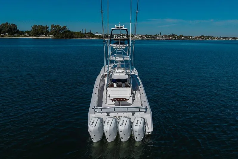  Yacht Photos Pics Aerial view of 2025 Sparks 46 boat with four powerful engines on calm water.