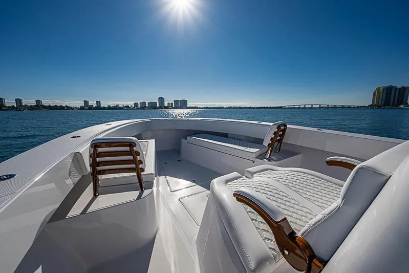  Yacht Photos Pics Luxurious Sparks 46 boat interior, 2025 model, with elegant seating and ocean view.