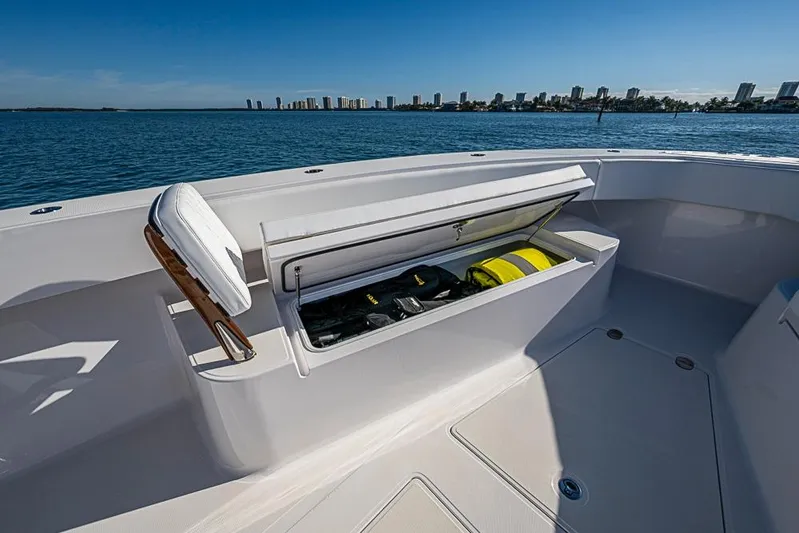  Yacht Photos Pics Open storage compartment on Sparks 46 boat, 2025 model, with ocean view and city skyline.