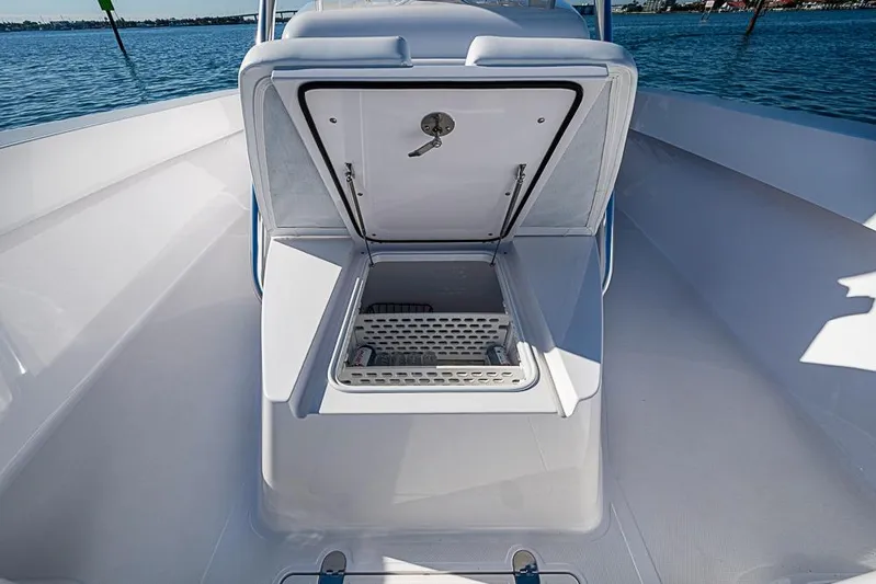  Yacht Photos Pics Open storage compartment on Sparks 46 boat, 2025 model, with ocean view background.