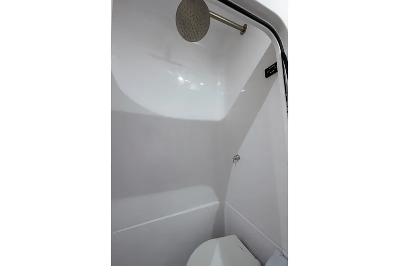  Yacht Photos Pics Modern shower interior in 2025 Sparks 46 model, featuring sleek design and fixtures.