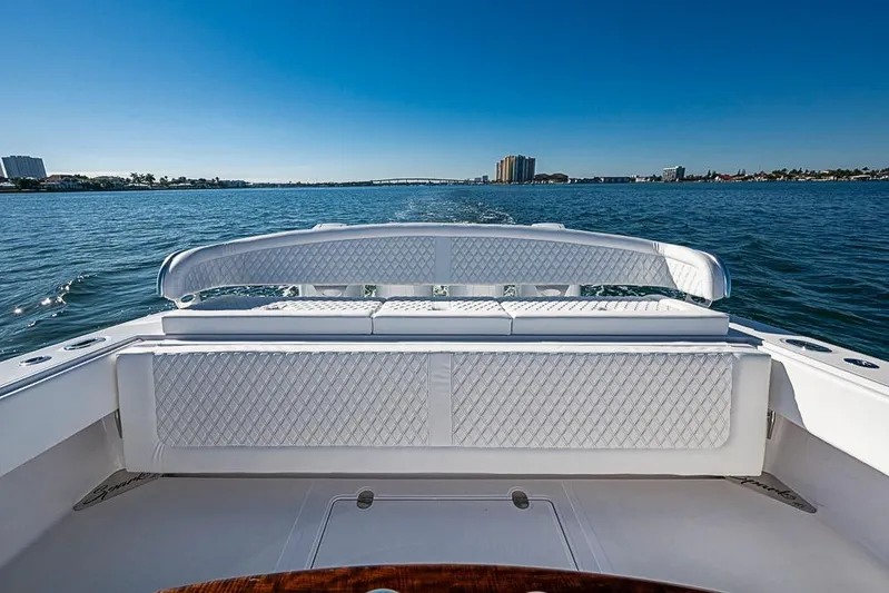  Yacht Photos Pics Luxurious Sparks 46 boat interior with white seating, cruising on a sunny day, 2025 model.