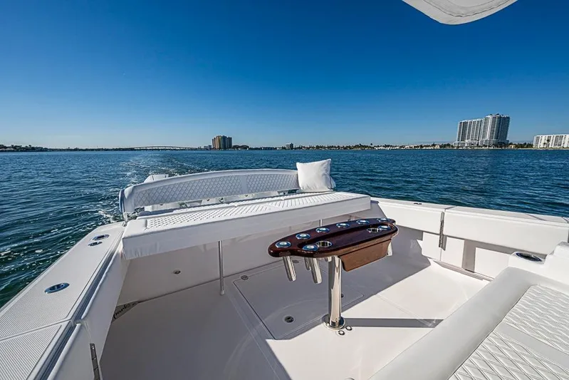  Yacht Photos Pics Luxurious Sparks 46 boat interior, 2025 model, with ocean view and modern seating.