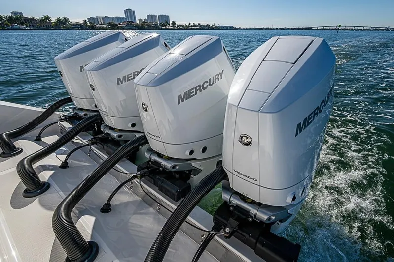  Yacht Photos Pics Four Mercury outboard engines on a Sparks 46 boat, 2025 model, cruising on water.