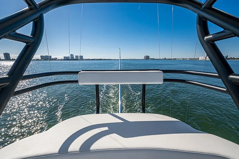  Yacht Photos Pics View from Sparks 46 boat, 2025 model, overlooking calm ocean and distant city skyline.