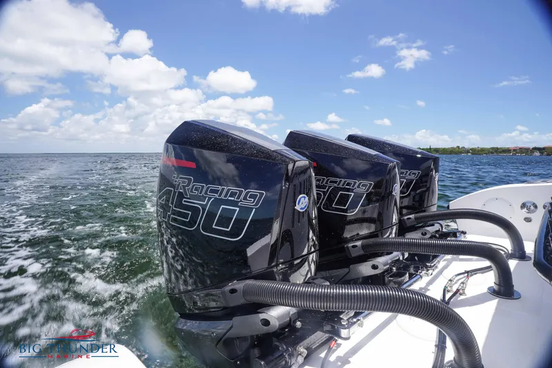  Yacht Photos Pics 2023 Fountain 38 TE boat with triple Mercury Racing 450 engines on open water.