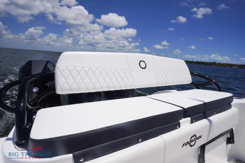  Yacht Photos Pics 2023 Fountain 38 TE boat with white seating on open water.