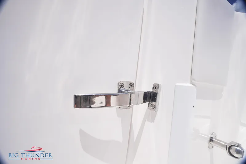  Yacht Photos Pics Close-up of a 2023 Fountain 38 TE boat latch and handle.