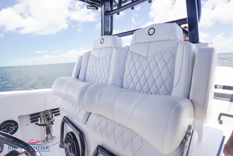  Yacht Photos Pics 2023 Fountain 38 TE boat with luxurious white leather seats and diamond stitching.