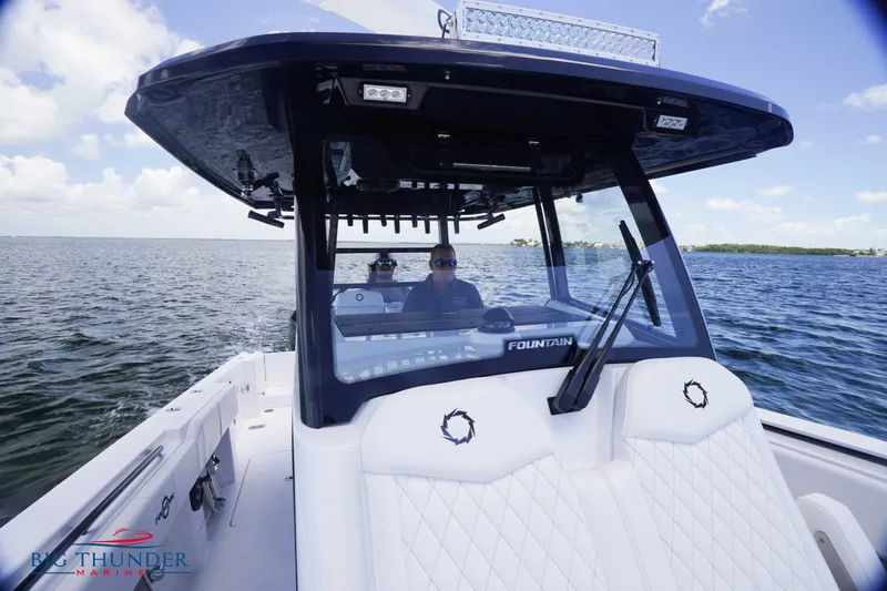  Yacht Photos Pics 2023 Fountain 38 TE boat cruising on open water.