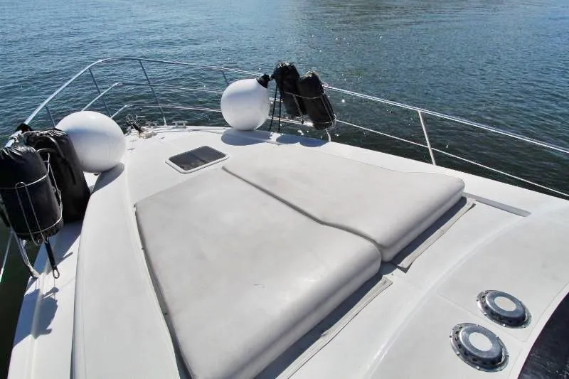  Yacht Photos Pics 1999 Azimut 58 yacht deck with sun pads and ocean view.