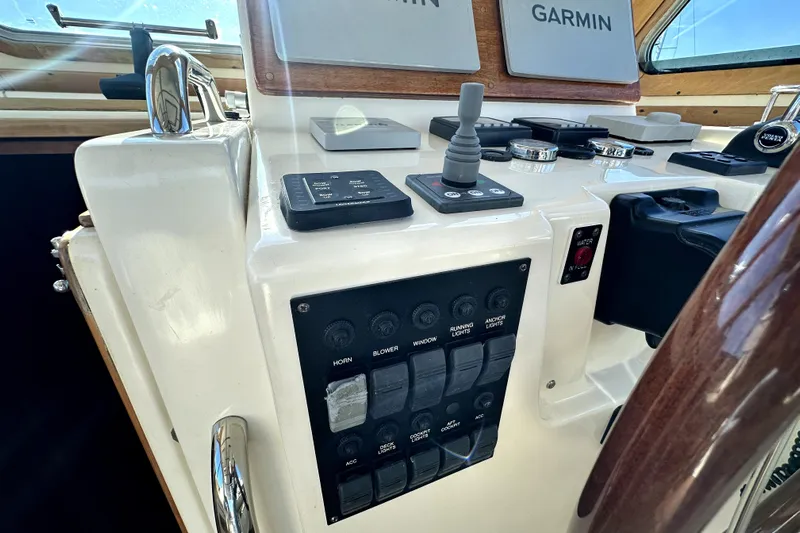 Destiny Yacht Photos Pics Control panel of a 2007 Sabre 34 Express boat with Garmin navigation equipment.