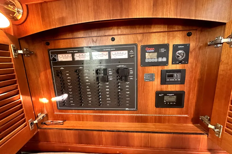Destiny Yacht Photos Pics Electrical control panel inside 2007 Sabre 34 Express boat, featuring various switches and gauges.