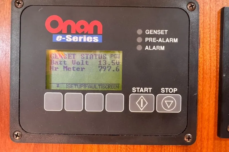 Destiny Yacht Photos Pics Onan e-Series genset control panel displaying battery voltage and hour meter. Sabre 34 Express 2007.