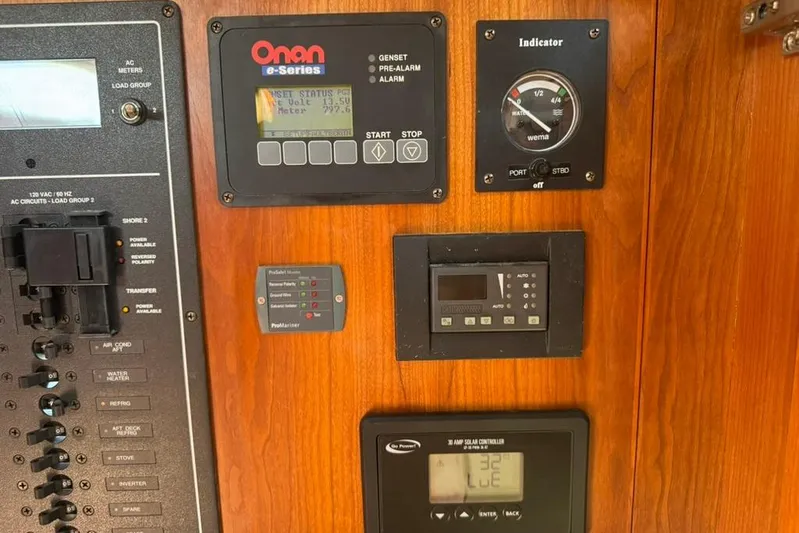 Destiny Yacht Photos Pics Control panel of a 2007 Sabre 34 Express boat with various gauges and switches.