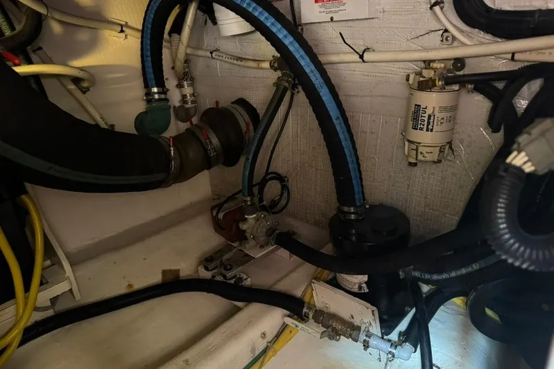 Destiny Yacht Photos Pics Engine compartment of a 2007 Sabre 34 Express with hoses and filter system.