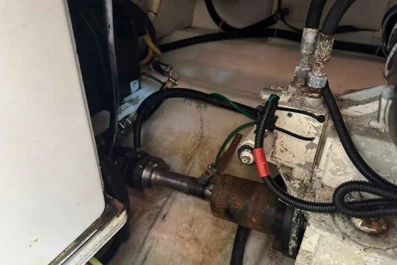 Destiny Yacht Photos Pics Engine compartment of a 2007 Sabre 34 Express boat, showing mechanical components and wiring.