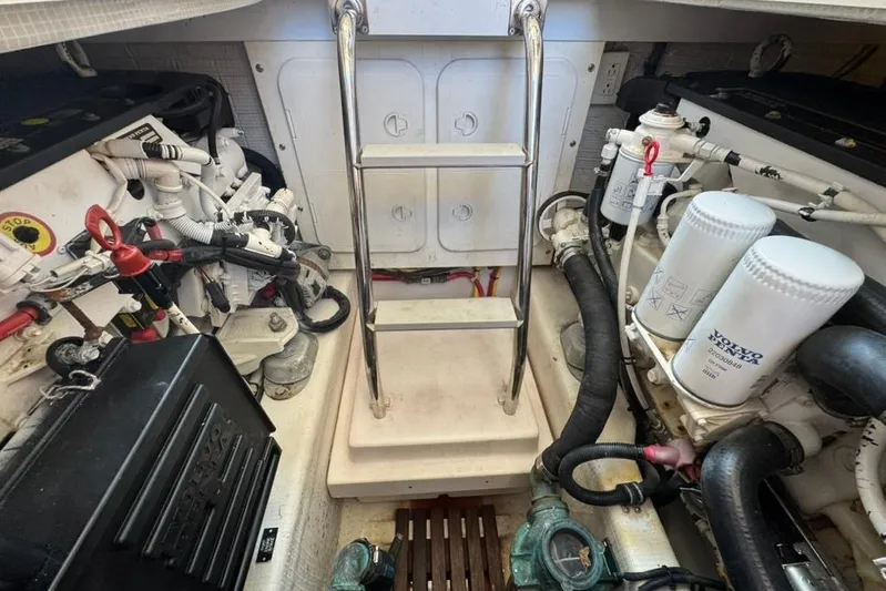 Destiny Yacht Photos Pics Engine room of 2007 Sabre 34 Express boat with visible components and ladder.
