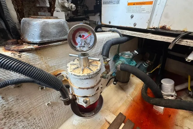 Destiny Yacht Photos Pics Engine room of 2007 Sabre 34 Express with pressure gauge and hoses.