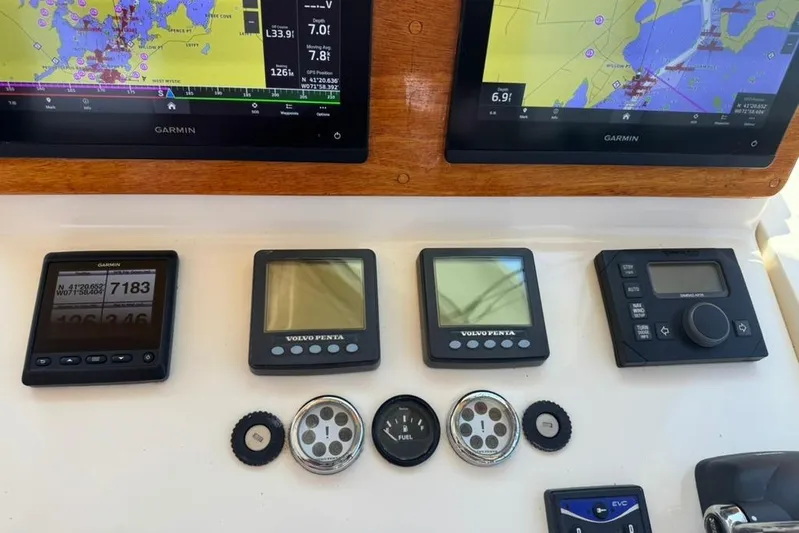 Destiny Yacht Photos Pics Dashboard of a 2007 Sabre 34 Express with Garmin and Volvo Penta displays.