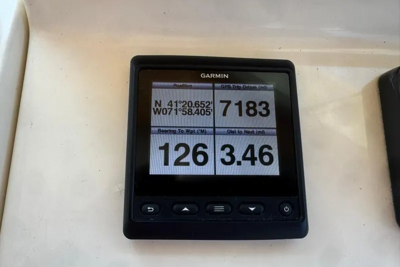 Destiny Yacht Photos Pics Garmin GPS display on 2007 Sabre 34 Express, showing coordinates and navigation data.