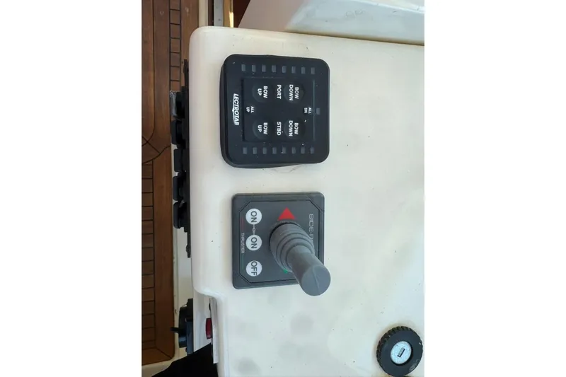 Destiny Yacht Photos Pics 2007 Sabre 34 Express boat controls with joystick and panel display.