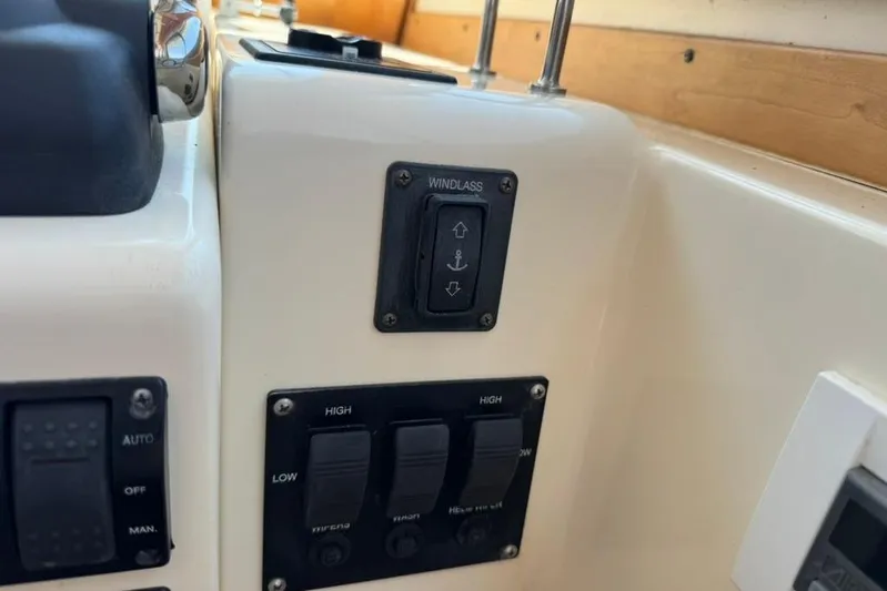 Destiny Yacht Photos Pics Control panel on a 2007 Sabre 34 Express boat, featuring windlass and switch controls.
