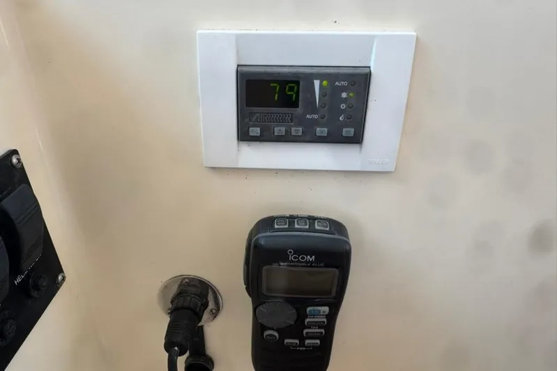 Destiny Yacht Photos Pics 2007 Sabre 34 Express boat control panel with digital display and radio.