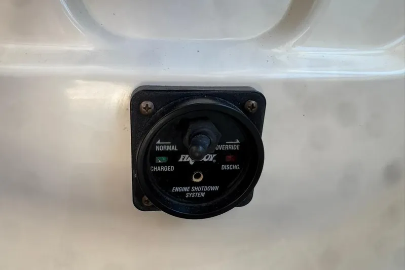 Destiny Yacht Photos Pics Engine shutdown system on 2007 Sabre 34 Express boat, featuring control dial and indicators.