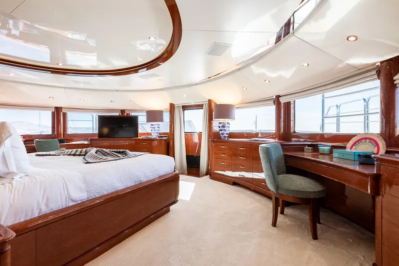 Checkmate Yacht Photos Pics Luxurious interior of 2013 Benetti 44 yacht with elegant wood finishes and modern amenities.