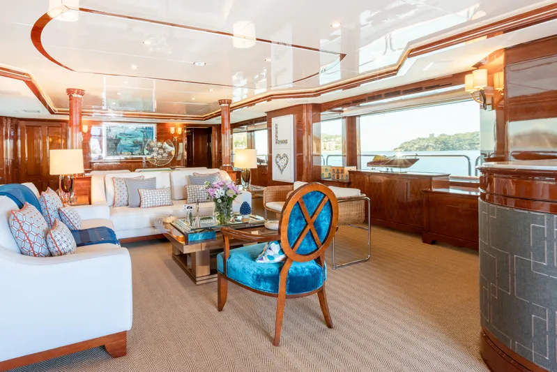 Checkmate Yacht Photos Pics Luxurious interior of 2013 Benetti 44 yacht with elegant furnishings and large windows.