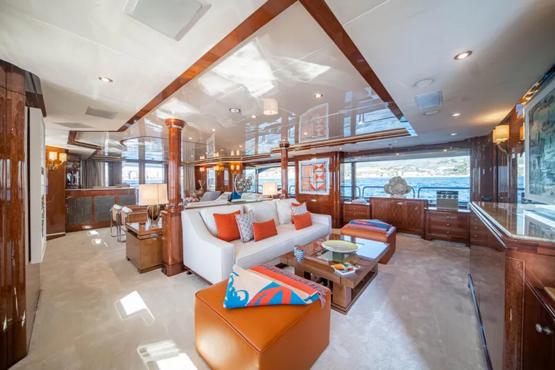 Checkmate Yacht Photos Pics Luxurious interior of 2013 Benetti 44 yacht with elegant furnishings and panoramic windows.