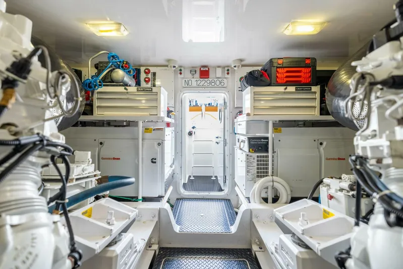 Mighty Mouse Yacht Photos Pics Engine room of 2011 Viking 70 Convertible yacht, featuring organized equipment and storage.