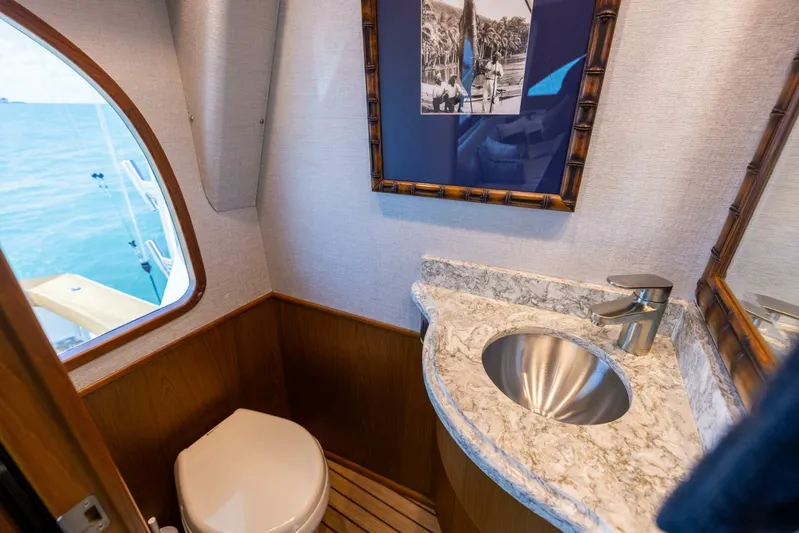 Mighty Mouse Yacht Photos Pics Luxurious bathroom in 2011 Viking 70 Convertible yacht with ocean view.