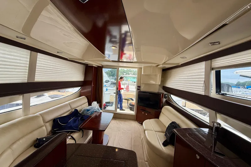 Freshwater Boat- New Trade-in- Obo Yacht Photos Pics Luxurious interior of 2011 Meridian 341 Sedan yacht with leather seating and modern amenities.