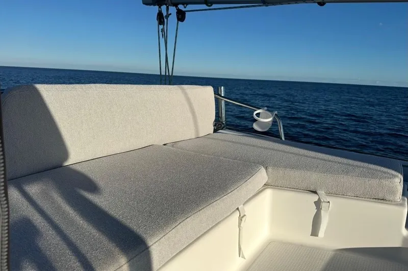 Monseas Yacht Photos Pics Fountaine Pajot Helia 44 catamaran deck with cushioned seating, ocean view, 2014 model.