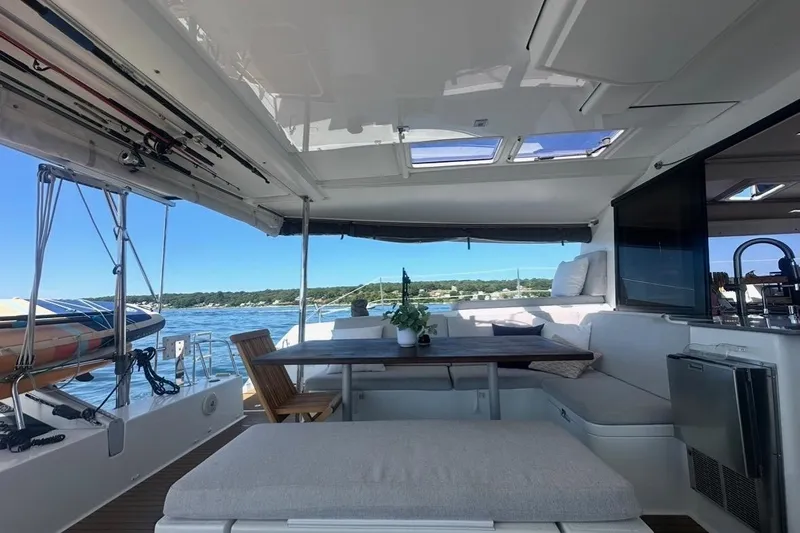 Monseas Yacht Photos Pics Luxurious 2014 Fountaine Pajot Helia 44 catamaran interior with seating and ocean view.