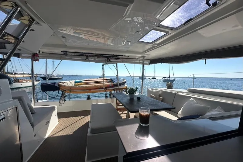Monseas Yacht Photos Pics Spacious deck of 2014 Fountaine Pajot Helia 44 catamaran with ocean view.